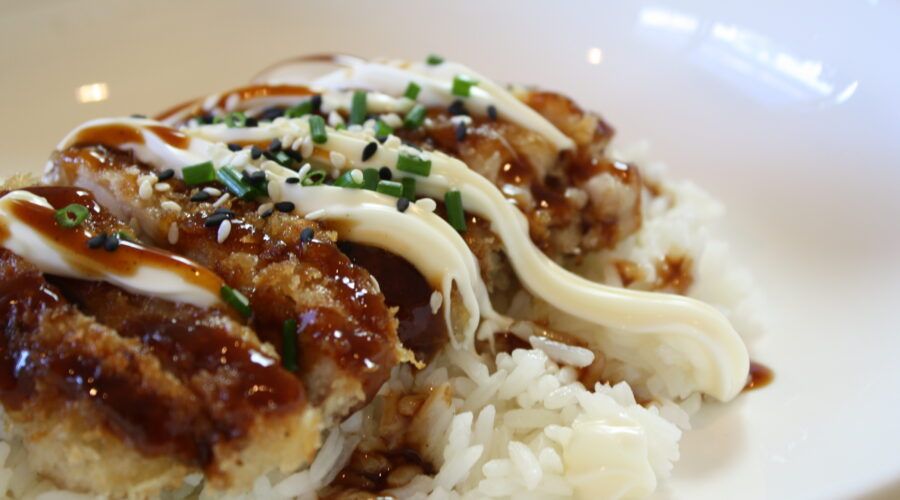 Crumbed chicken crispy fried, served on rice and topped with a swirl of mayonnaise