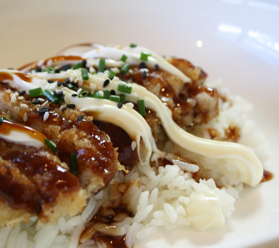 Crumbed chicken crispy fried, served on rice and topped with a swirl of mayonnaise